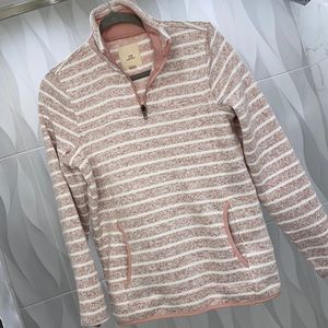 Blush & white stripes. Warm material. Front pocket detail. Top zipper.